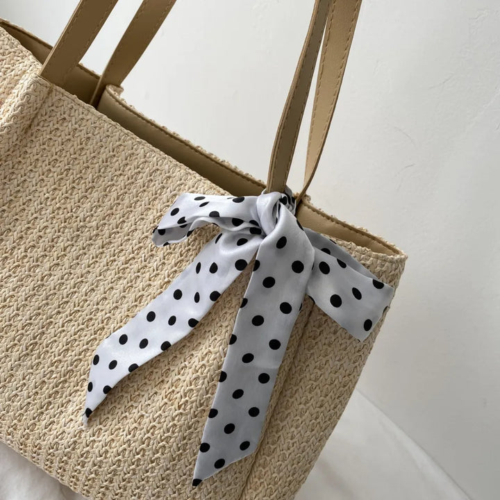 SOLINE – Woven Summer Bag with Leather Details & Bow Accent